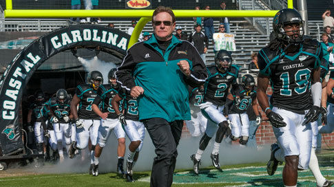 Running onto field teal shirt 478